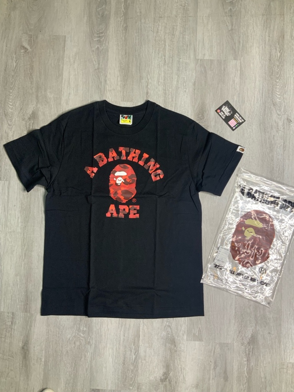 A Bathing Ape Black Tee with Red Camo Logo